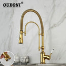 Golden kitchen faucet with white ceramic handle and swivel spout