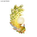 Golden peacock wall light with crystal shade – living room yellow & green