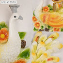 Golden peacock wall light with crystal shade – living room yellow & green