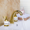 Golden plated bathroom faucet set with white ceramic handles