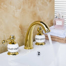 Golden plated bathroom faucet set with white ceramic handles