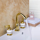 Golden plated bathroom faucet set with white ceramic handles