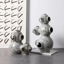 Gray speckled abstract planet ceramic ornament living room sculpture