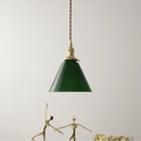 Green glass pendant light with copper canopy for dining room