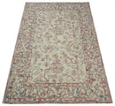 Hand Tufted 5x8 Pink and Beige Wool Textured Loop Area Rug