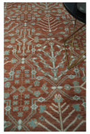 Hand knotted 8x10 Rust and Aqua Floral wool Area Rug