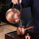 Handmade hammered copper tea pot with knitting handle dining room set