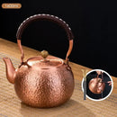 Handmade hammered copper tea pot with knitting handle dining room set