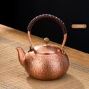 Handmade hammered copper tea pot with knitting handle dining room set