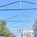 Metal roof structure against a clear blue sky