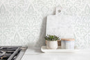 Ikat Wallpaper with a Subtle Damask Motif in Sage Green - D356