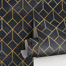 Art Deco Wallpaper with an Interlocking Line Motif in Black and Gold - A392