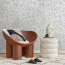 Abstract Wallpaper with a Pattern of Doodled Faces in Black and White - B280