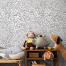Abstract Wallpaper with a Pattern of Doodled Faces in Black and White - B280