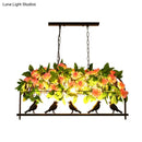 Industrial birdcage island pendant with roses – kitchen dining room