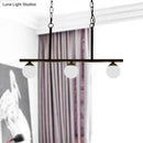 Industrial black 3-light opal glass globe pendant – dining room
