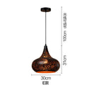 Industrial black and gold etched wrought iron chandelier dining room