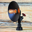 Industrial black metal table lamp with decorative red valve bedroom