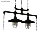 Industrial black pipe chandelier with red valve caps dining room light