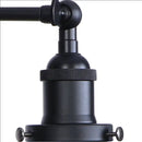 Industrial black swing arm wall light fixture with faceted glass shade