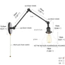 Industrial black swing arm wall light fixture with faceted glass shade