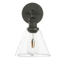 Industrial black wrought iron wall lamp with clear glass shade bedroom