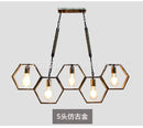 Industrial brass hexagonal pendant light – bar and restaurant dining