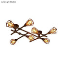 Industrial brass intersecting piping ceiling light dining room cage