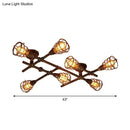 Industrial brass intersecting piping ceiling light dining room cage