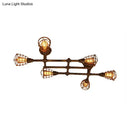 Industrial brass intersecting piping ceiling light dining room cage