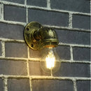 Industrial brass pipe wall sconce bedroom filament bulb light