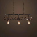 Industrial bronze wheel island pendant light with bare bulbs kitchen