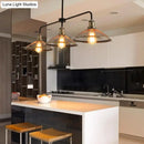 Industrial cage flared black and brass pendant light dining room