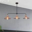 Industrial cage flared black and brass pendant light dining room