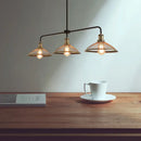 Industrial cage flared black and brass pendant light dining room