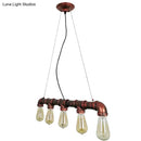 Industrial copper water pipe chandelier light fixture dining room