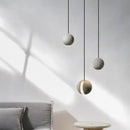 Industrial gray and gold cement pendant light dining room sphere
