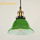 Industrial green glass pendant light dining room with brass accents