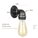 Industrial iron pipe wall sconce bedroom brass filament light