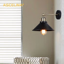 Industrial matte black & brass wall sconce – living room lighting