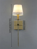 Industrial white wall lamp with brass finish for bathroom