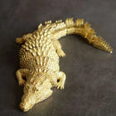 Intricate brass crocodile sculpture living room decor accessory