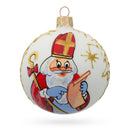 St. Nicholas Perusing His Gift List  Glass Ball Christmas Ornament 3.25 Inches