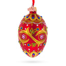 Blue Jewels On Red Glass Egg Ornament 4 Inches