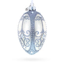 Silver Scrolls on White Glass Egg Ornament 4 Inches