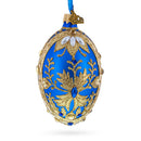 Golden Swirls on Blue Glass Egg Ornament 4 Inches