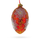 Red and Gold Paisley with Silver Starburst Glass Egg Ornament 4 Inches
