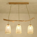 Lodge style wood pendant light with rattan shades for dining room