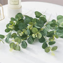 Lush artificial eucalyptus leaves garland with white flowers wedding decor