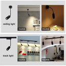 Matte black adjustable beam track light for store task lighting